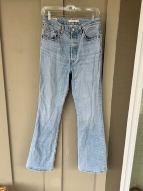 Levi Women’s Flare Jeans. Light medium wash